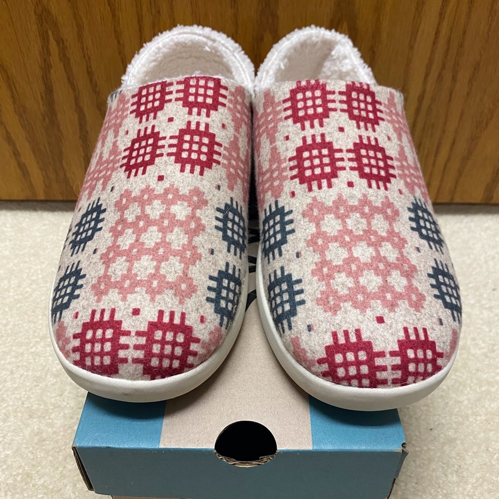 Toms slippers.